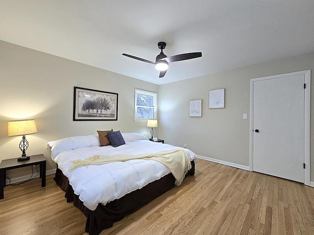 bedroom featuring ceiling fan and light hardwood / wood-style floors