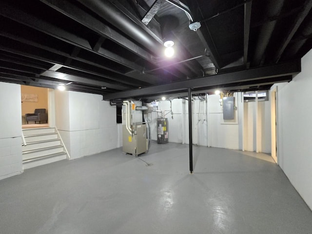 basement with water heater, heating unit, and electric panel