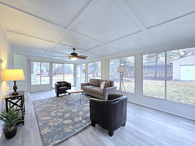 sunroom featuring coffered ceiling and ceiling fan