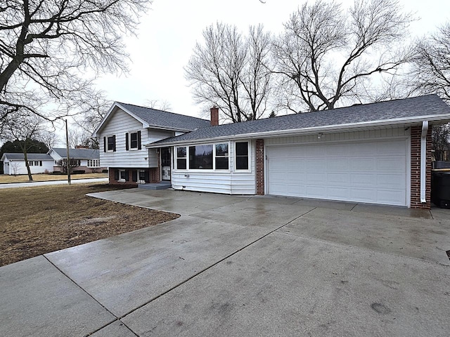 split level home with a garage