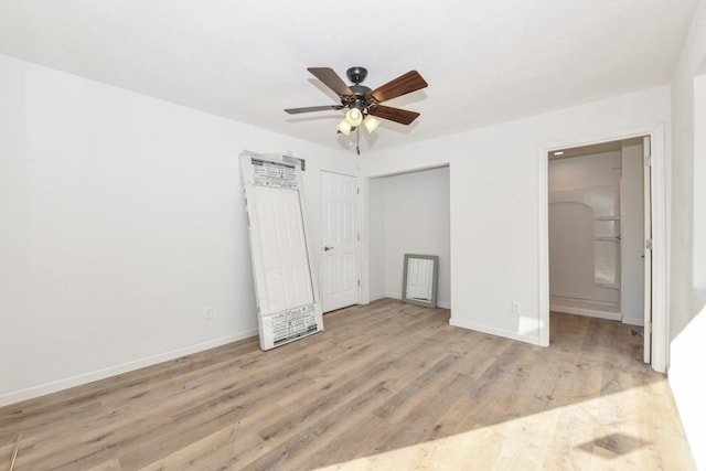 unfurnished bedroom featuring light hardwood / wood-style flooring and ceiling fan