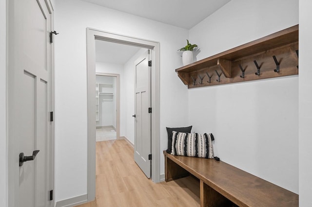 mudroom with light wood-style floors