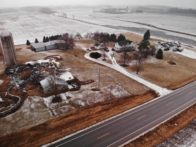 birds eye view of property featuring a rural view