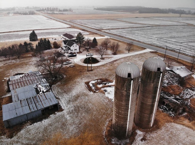 birds eye view of property with a rural view