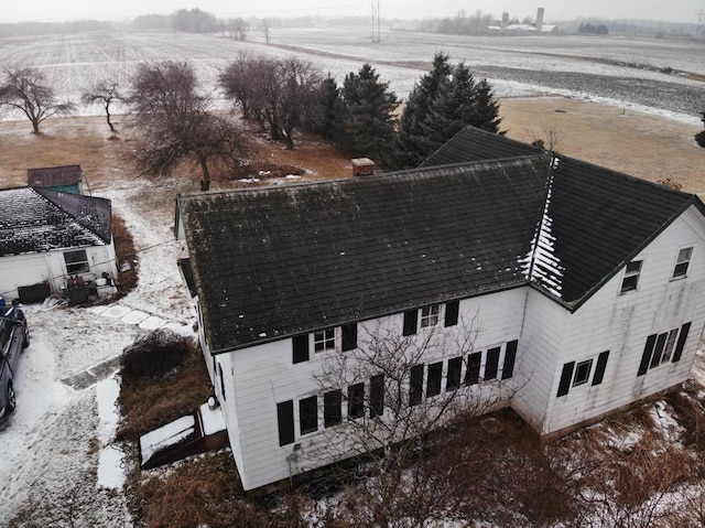 birds eye view of property with a rural view