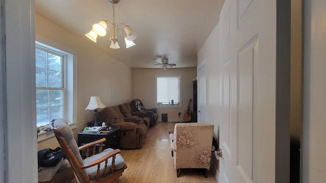 3290 Lark Rd, Greenleaf, WI 54126 - living room with a notable chandelier and light hardwood / wood-style floors