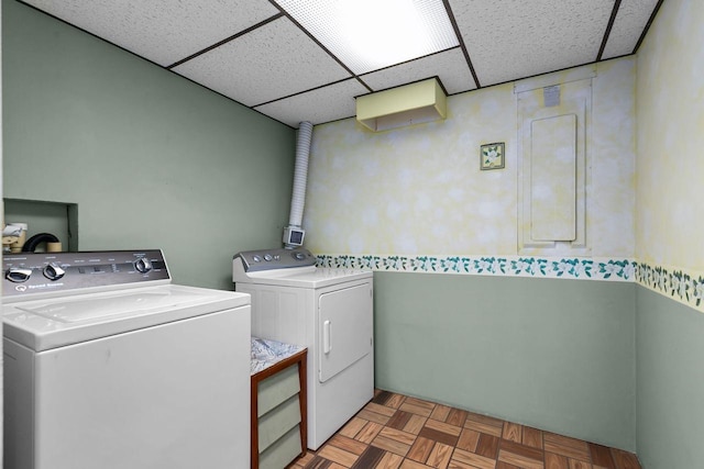 washroom featuring separate washer and dryer and light parquet flooring