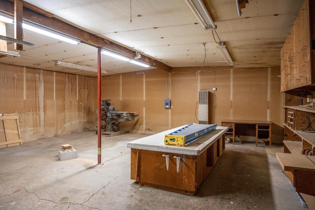 basement with a workshop area