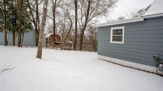 view of yard covered in snow