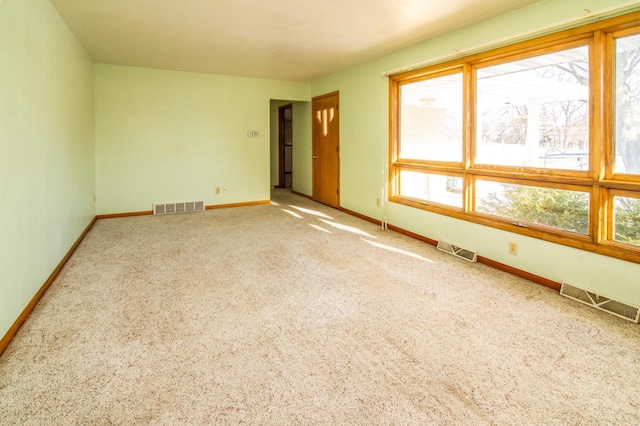 empty room with carpet flooring