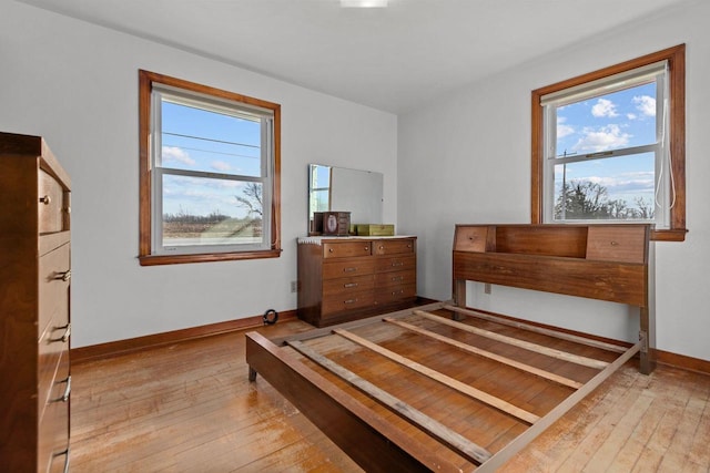 bedroom with light wood-type flooring