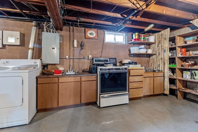 basement with washer / dryer, sink, and electric panel