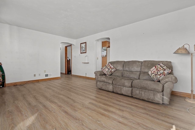 living room featuring light wood-type flooring