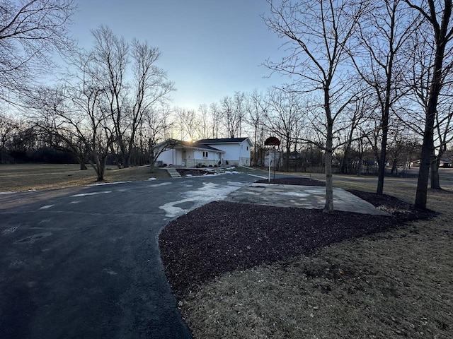 exterior space with basketball hoop