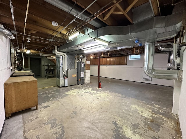 basement with heating unit and water heater