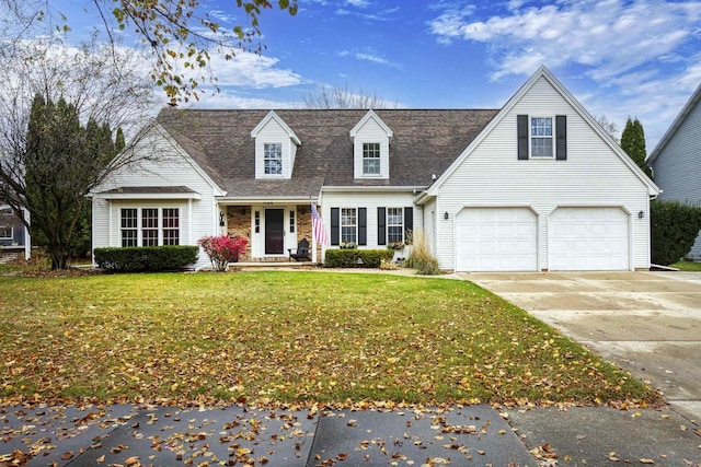 cape cod home featuring a garage and a front lawn