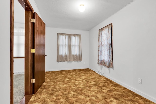 spare room with carpet