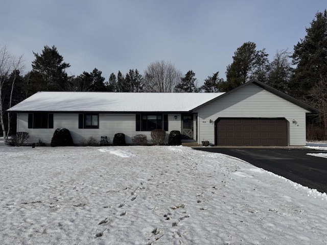 ranch-style house featuring a garage