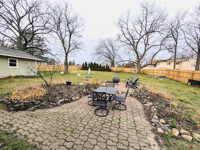 view of patio / terrace with a storage unit