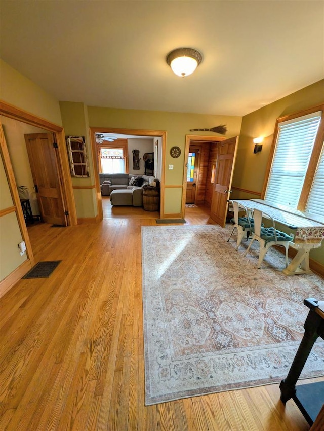 corridor featuring hardwood / wood-style floors