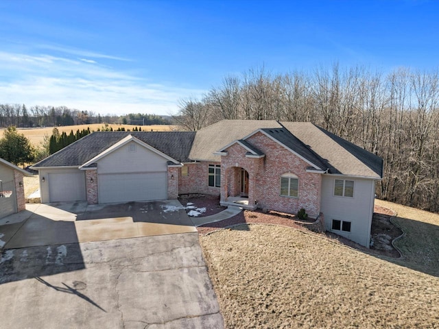 ranch-style house featuring a garage