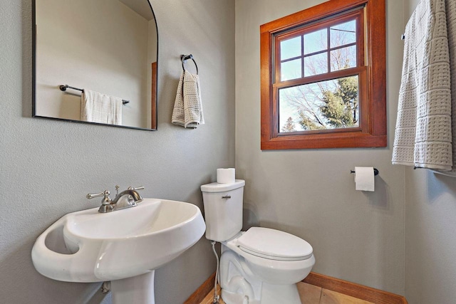 bathroom featuring sink and toilet