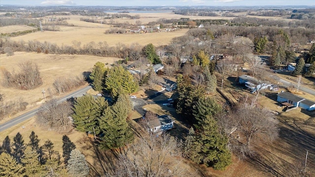 birds eye view of property featuring a rural view