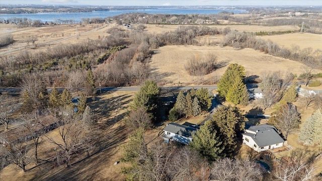 aerial view with a water view and a rural view