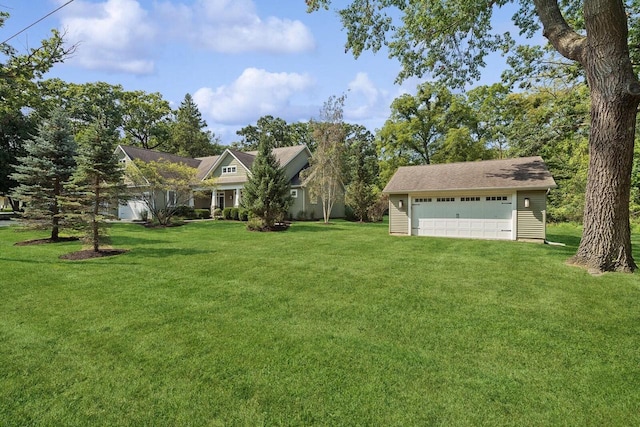 view of front of property featuring a garage and a front lawn