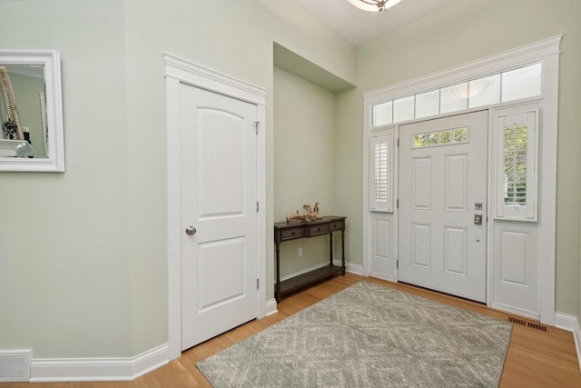 foyer entrance featuring hardwood / wood-style flooring