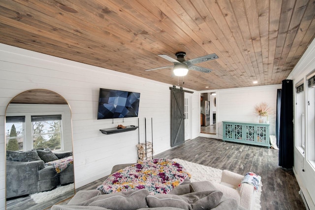 living room featuring wood ceiling, ceiling fan, a barn door, and dark hardwood / wood-style flooring