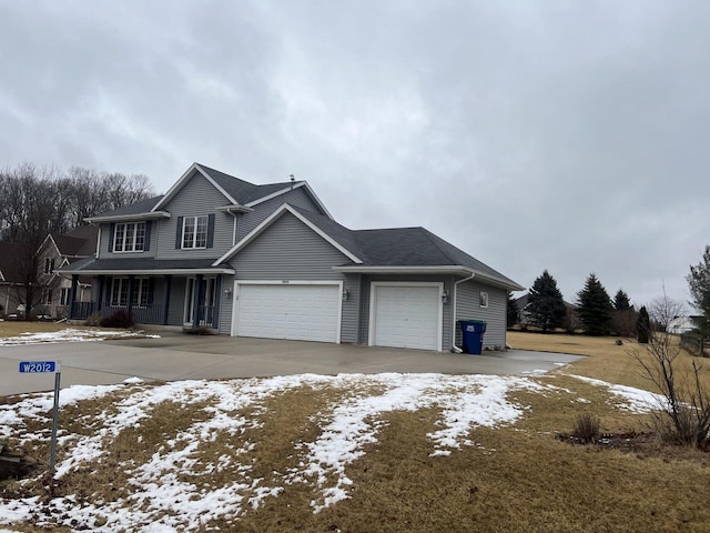 view of front of home with a garage