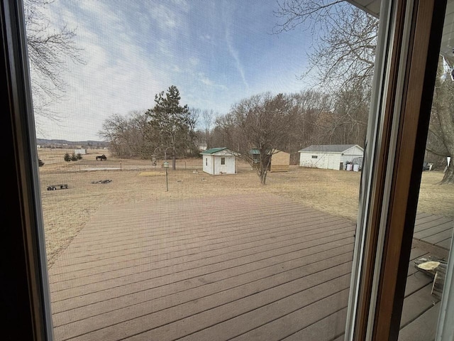 deck with a storage shed