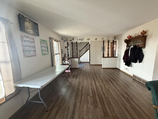 interior space with dark wood-type flooring