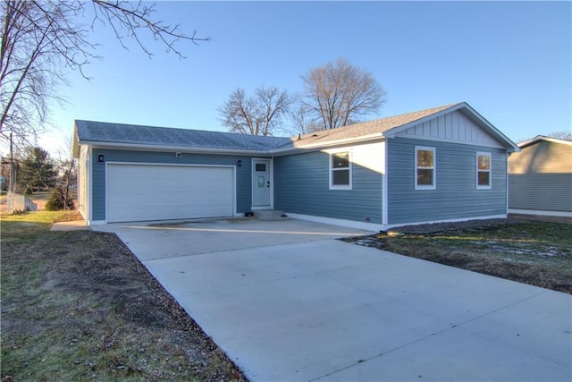 ranch-style house featuring a garage