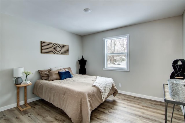 bedroom featuring light hardwood / wood-style floors