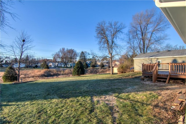 view of yard with a wooden deck