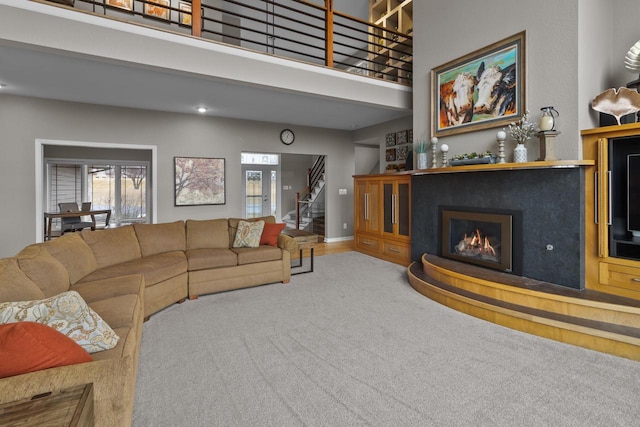 living room with a towering ceiling