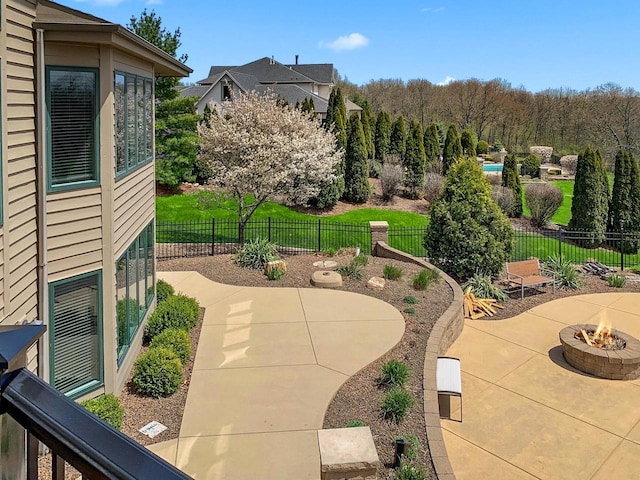 view of patio / terrace with a fire pit