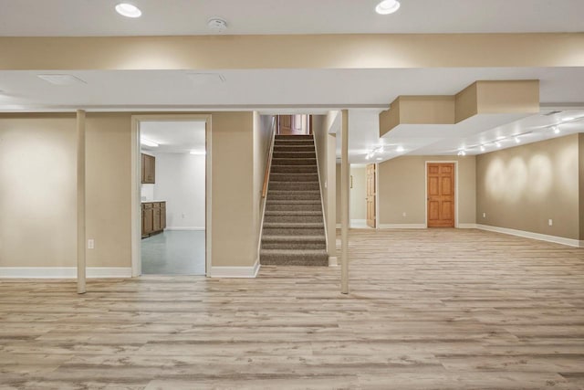 basement with light wood-type flooring