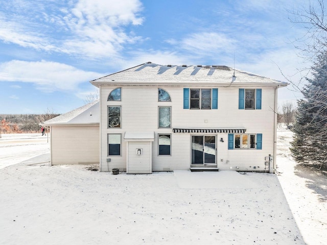 view of snow covered property