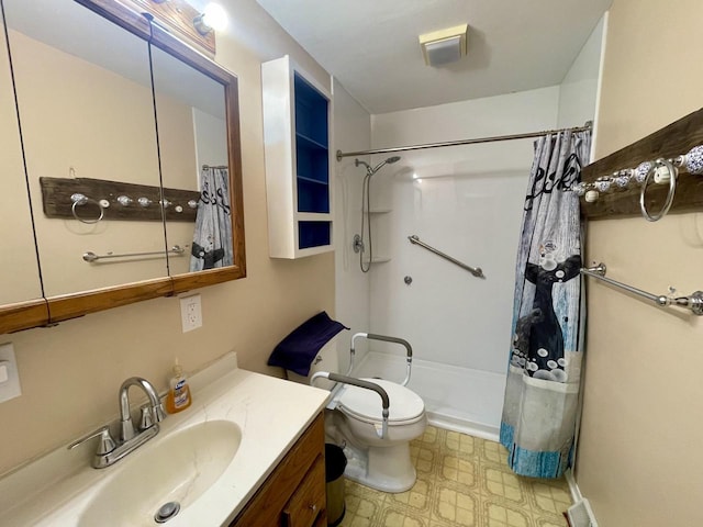 bathroom with a shower with curtain, vanity, and toilet