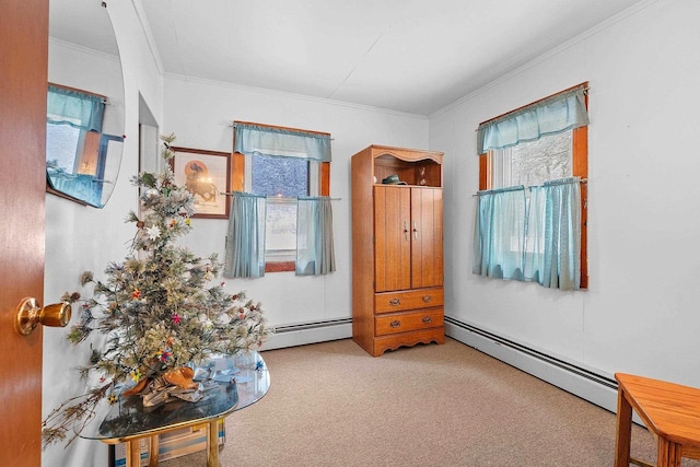 sitting room featuring crown molding, light carpet, and a baseboard heating unit