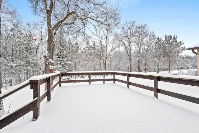 view of snow covered deck