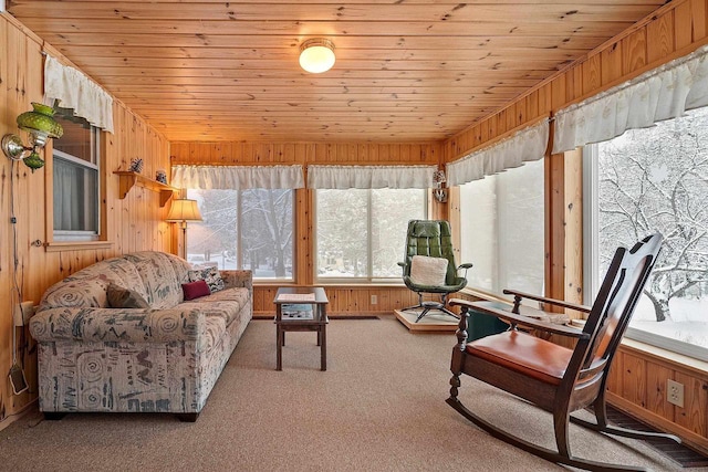 sunroom / solarium featuring wooden ceiling