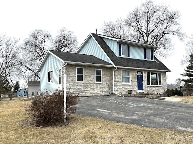 view of front of home with a front yard