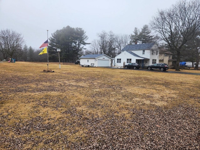 view of yard with a garage