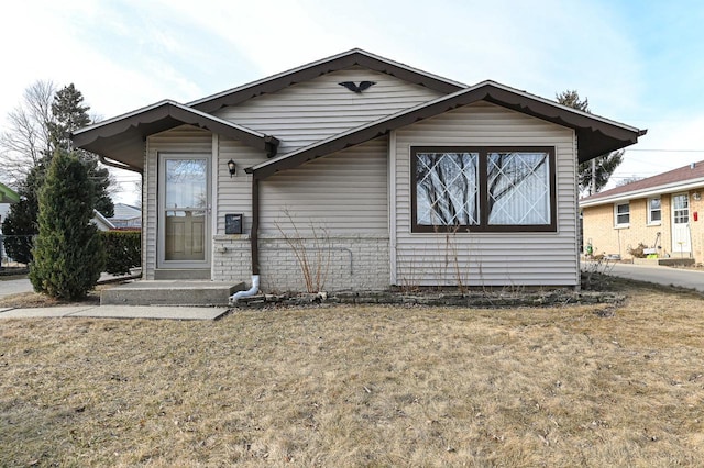 view of front of home with a front yard