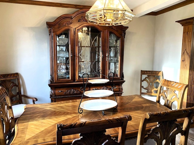 dining area with an inviting chandelier