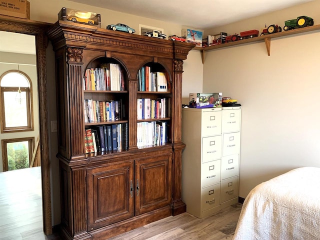 bedroom with light hardwood / wood-style floors